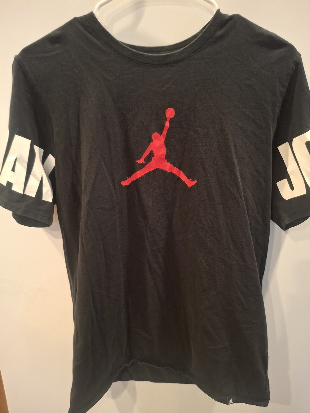 Jordan Black Short Sleeve Tee with Red Jumpman and White Sleeve Text